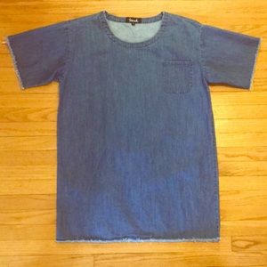 Denim dress with frayed details and front pocket.
